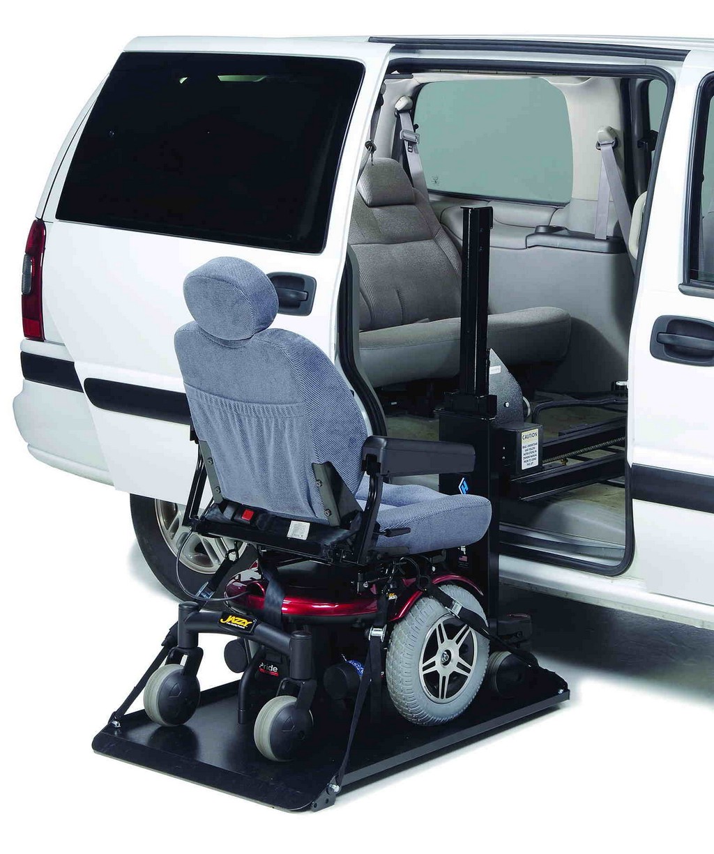 KlearVue Wheelchair Lift in a white van with wheelchair on